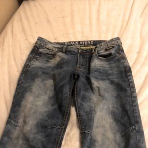 The pants are blue and white they have a little rip effect